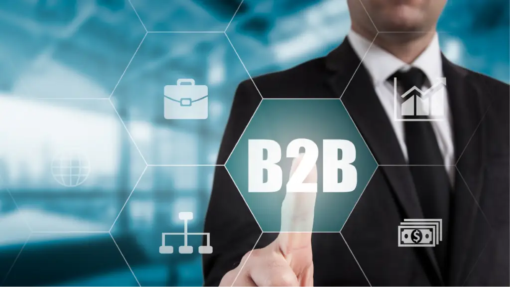 Building Authentic B2B Communities A business professional interacting with a digital B2B interface featuring connected icons and analytics symbols, representing business-to-business networking, authentic community building, collaboration, and strategic business growth.