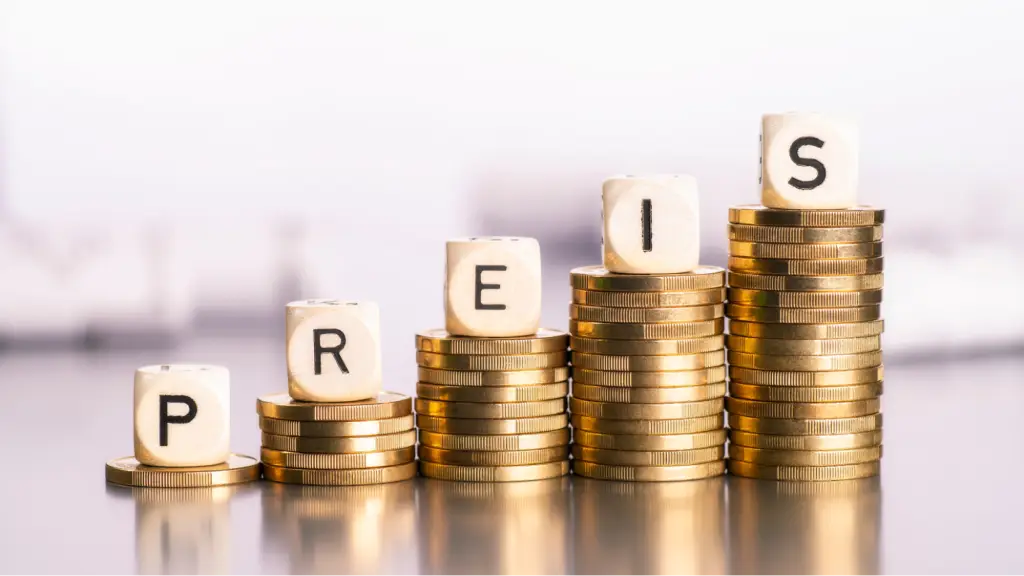 Stacks of gold coins arranged in ascending height are topped with lettered blocks spelling “PRICE,” symbolizing pricing strategies, revenue growth, profit margins, and increasing business value.