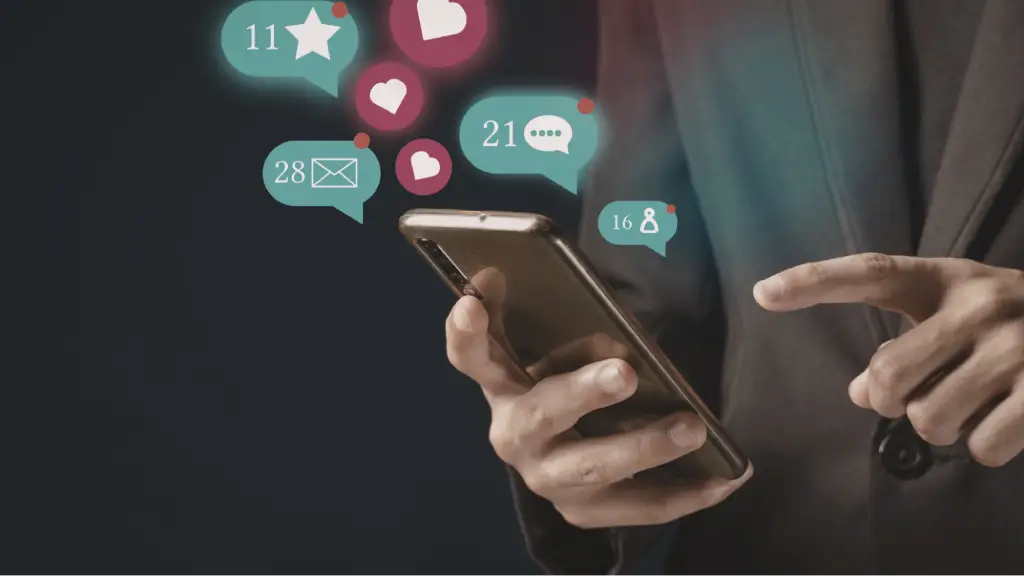 A person in a suit holding a smartphone with glowing digital social media notification bubbles floating above it, showing icons for likes, comments, messages, and followers with numbers.