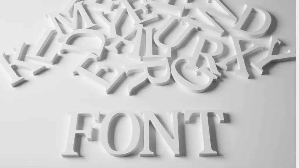 The Rise of Analog Textures and Kinetic Typography A collection of scattered white letters with the word 'FONT' prominently displayed, representing typography, analog textures, and the use of creative text elements in modern graphic design.