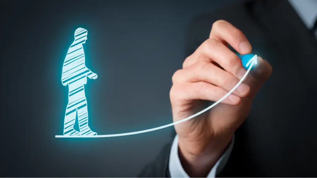 A hand drawing an upward growth arrow beside a human figure icon, symbolizing progress, long-term success, business growth, professional development, and continuous improvement.
